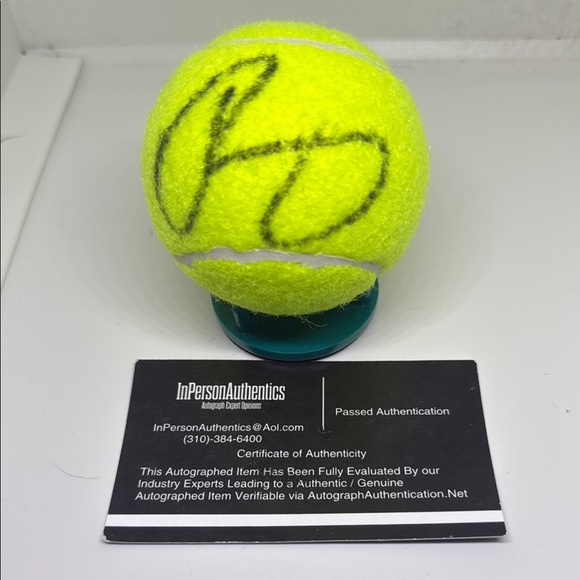 Autographed Tennis Ball with Display Stand